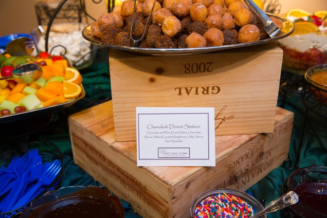 chanukah donut station with caterer sign